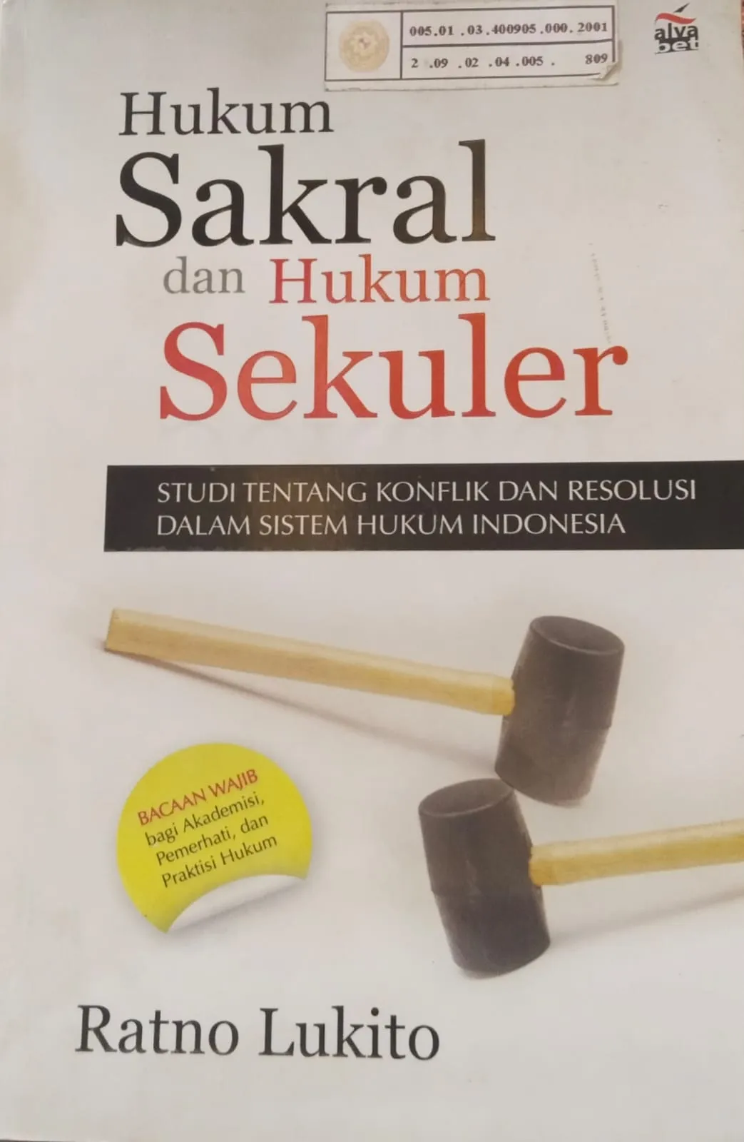 HUKUM SAKRAL DAN HUKUM SEKULER